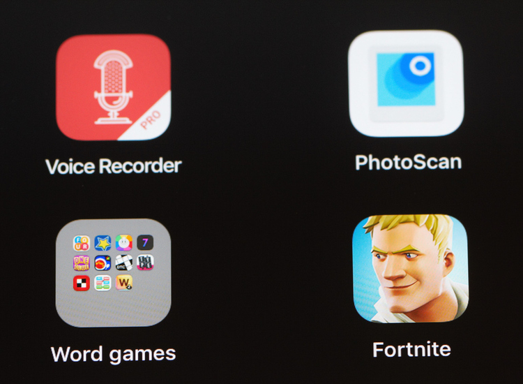 view larger image multiple mobile apps are visible on an apple ipad screen including the popular video games fortnite - fortnite for apple ipad